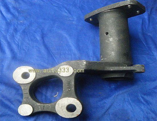 after the left bracket with a bushing assembly
